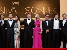 From left, actor Garret Hedlund, director Walter Salles, actors Tom Sturridge, Kristen Stewart, Danny Morgan, Kirsten Dunst, producer Roman Coppola, actors Sam Riley and Viggo Mortensen arrive for the screening of On the Road at the 65th international film festival, in Cannes, southern France, on Wednesday, May 23, 2012. (AP Photo/Lionel Cironneau)