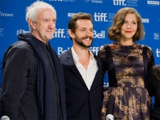 Actors Jonathan Pryce, Hugh Dancy, and Maggie Gyllenhaal stand for a photo at a press conference promoting the film 'Hysteria' during the Toronto International Film Festival in Toronto, on Thursday Sept. 15, 2011. (Aaron Vincent Elkaim / THE CANADIAN PRESS)