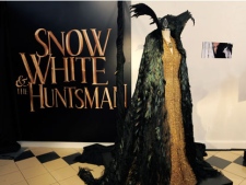 This May 3, 2012 photo shows a costume from the film "Snow White and the Huntsman" in Los Angeles. The costume, designed by Academy Award-winning costume designer Colleen Atwood, was worn by actress Charlize Theron in the film. (AP Photo/Chris Pizzello)