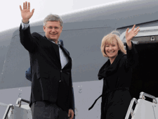 Prime Minister Stephen Harper and wife Laureen depart Ottawa on Sunday, June 3, 2012, on route to London, England, to take part in events for the Queens Diamond Jubilee. THE CANADIAN PRESS/Sean Kilpatrick