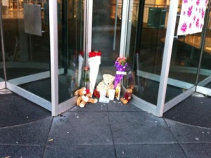 A small memorial is pictured outside Eaton Centre on Monday, June 4, 2012, after a man was killed and others were wounded in a shooting in the mall's food court two days earlier. (CTV/Tamara Cherry)