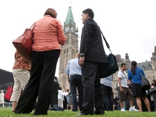 Senators, parliamentarians and their staff were evacuated from Parliament Buildings following a 5.5 magnitude earthquake in Ottawa, Wednesday June 23, 2010.(THE CANADIAN  PRESS/Adrian Wyld)