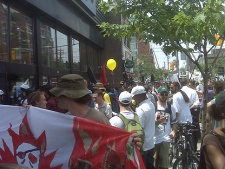Toxic Tour Toronto protesters work their way through Toronto. (CP24/Nathan Downer)
