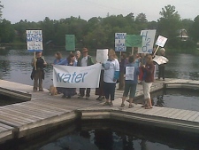 Protesters raise awareness about water as a human right. (CP24/Brian van Binnendyk)