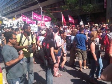 Protesters make their way through Toronto on June 25, 2010 ahead of the G20 summit.
