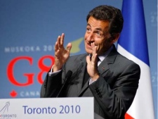 French President Nicolas Sarkozy speaks during his final press conference at the conclusion of the G20 Summit Sunday, June 27, 2010, in Toronto. (Christophe Ena/AP Photo)