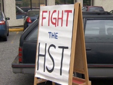 An anti-HST sign outside an anti-tax rally on June 29, 2010. (CTV)