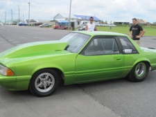 This green Mustang was stolen from a garage in Mississauga, along with the trailer that it was inside.