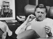 This Oct. 21, 1981, file photo shows New York Yankees owner George Steinbrenner  working at his desk at Yankee Stadium in New York, before Game 2 of the World Series. 