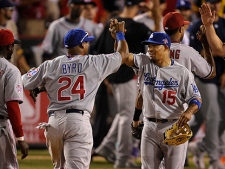 National League's Marlon Byrd (24), of the Chicago Cubs, and Rafael Furcal, of the Los Angeles Dodgers, celebrate their team's 3-1 win over the American League in the All-Star baseball game Tuesday, July 13, 2010, in Anaheim, Calif. (AP Photo/Jae C. Hong) 
