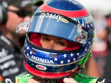 Danica  Patrick  adjusts her helmet before the first practice sessoin for the Toronto INDY in Toronto on Friday July 16, 2010. THE CANADIAN PRESS/Frank Gunn