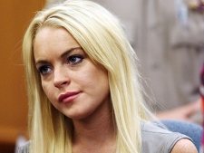 Lindsay Lohan is shown in a court, Tuesday, July 20, 2010, in Beverly Hills, Calif., where she was taken into custody to serve a jail sentence for probation violation. (AP Photo/Al Seib, pool) 