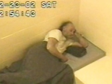 Robert Pickton is shown in a jail cell during a discussion with an undercover police officer in February 2002.
