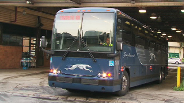A Greyhound bus leaves the station in Toronto on Tuesday, Aug. 10, 2010.