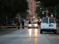 Police investigate after a man was shot on Sherbourne Street early Friday morning. (CP24/Tom Stefanac)