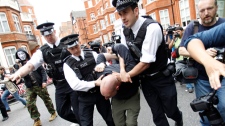 Assange supporter arrested