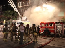 Firefighters battle a blaze that started at Canada Computers on College Street on Sunday, Sept. 5, 2010.