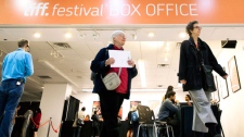 People leave the box office prior to the beginning of the Toronto International Film Festival in Toronto Wednesday, September 7, 2011. TIFF officially runs from Thursday, September 8 through to Sunday, September 18. THE CANADIAN PRESS/Darren Calabrese