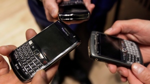Blackberry smartphones are displayed. (AP Photo/Richard Drew)