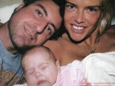 This image provided by the Los Angeles County Superior Court shows Anna Nicole Smith with her daughter, Dannielynn and Howard K. Stern. 