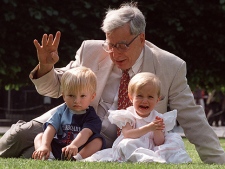 Professor Robert Edwards, the British pioneer of IVF treatment, sits with two of his 'test-tube-babies', Sophie and Jack Emery who celebrate their second birthday in London in this file photo dated Monday July 20, 1998.(AP Photo/Alastair Grant, File)