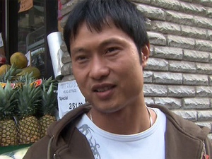 David Chen is seen outside the is shop on Spadina Avenue in Toronto, Sunday, Oct. 3, 2010.d