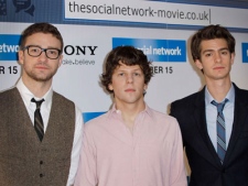 Actors, from left to right, Justin Timberlake, Jesse Eisenberg and Andrew Garfield pose during a photocall for the film The Social Network, Thursday, Oct. 7, 2010, at a central London hotel. In The Social Network, director David Fincher and screenwriter Aaron Sorkin explore the moment at which Facebook was invented. (Joel Ryan/AP Photo)