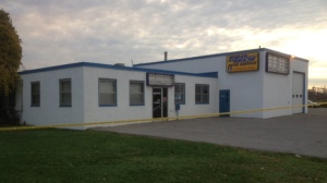 Whitby standoff auto shop surrounded by tape