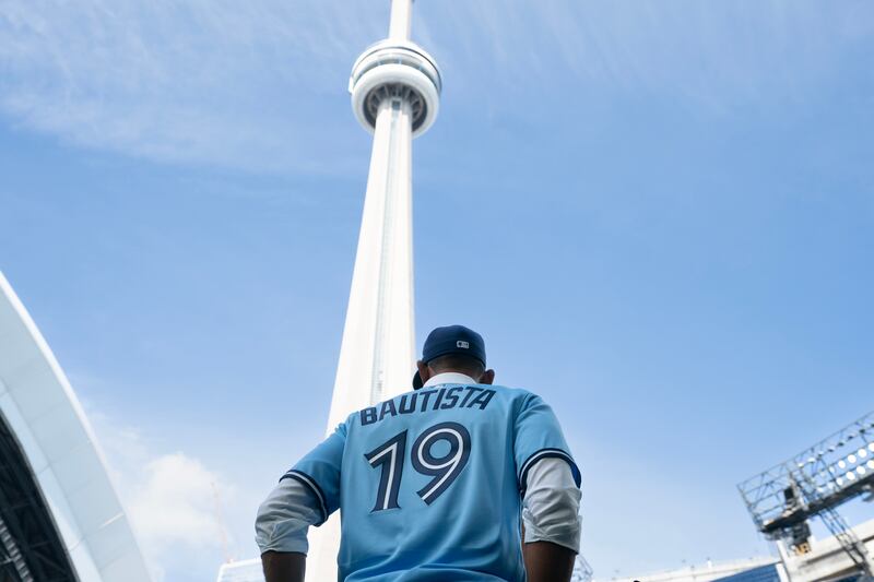 Former Toronto Blue Jays player Jose Bautista watches batting practice before the Jays take on the Chicago Cubs, in Toronto, Friday, Aug. 11 2023. THE CANADIAN PRESS/Chris Young