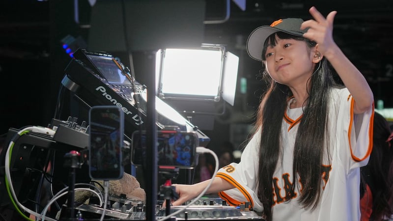 Japan's DJ Rinoka bobs to the beat as a child prodigy techno artist