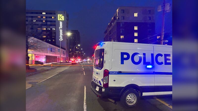 The back of a police van is pictured near the site where a Halifax Regional Police officer shot a suspect on Quinpool Road on Jan. 17, 2026. (Jesse Thomas, CTV Atlantic)