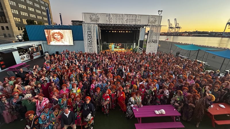 Hundreds of people gather dressed as Mrs. Roper.