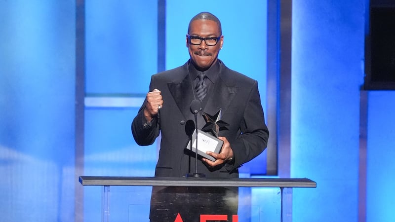 Eddie Murphy receives life achievement award by AFI, drawing standing ovation at star-filled tribute