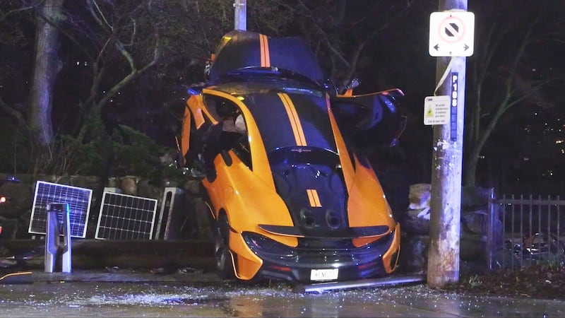 McLaren goes airborne, crashing outside Casa Loma