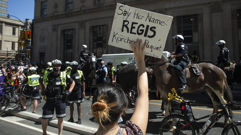 Toronto woman who fell from balcony after police arrived had seizures, inquest hears