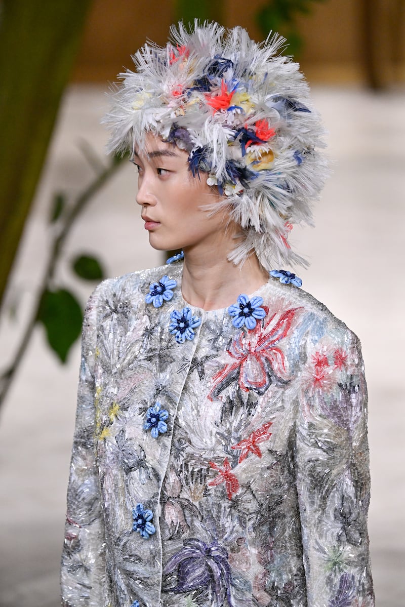 A model wears a creation as part of the Chanel Haute Couture Fall/Winter 2026-27 Women's collection presented in Paris on July 7, 2026. (Emma Da Silva / AP Photo)