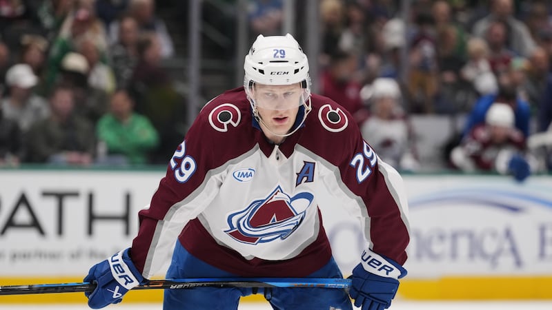 Colorado Avalanche's Nathan MacKinnon waits on a face-off against the Dallas Stars during an NHL hockey game Saturday, April 4, 2026, in Dallas. (AP Photo/Tony Gutierrez)