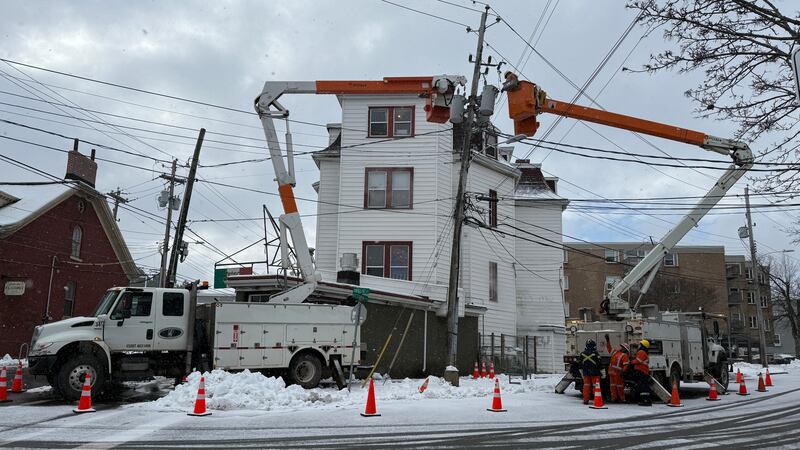 Power crews work at the corner of Inglis Street and Victoria Road in Halifax on Jan. 20, 2026. (Callum Smith/CTV Atlantic)