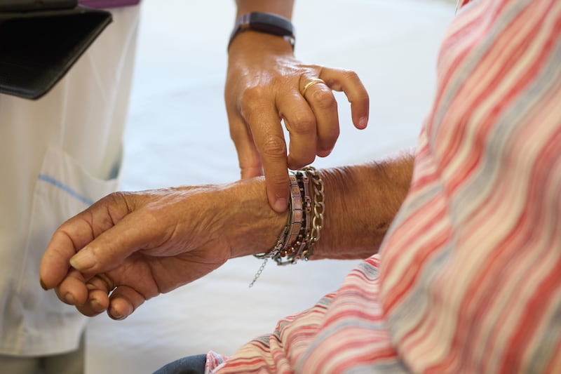Alberto Sbattella, 91, has his heart rate checked at a public health-care centre in Rome that monitors the health of vulnerable residents during heat waves on July 17, 2026. (Alessandra Tarantino / AP Photo)