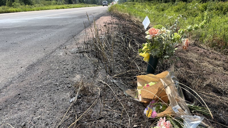 Tribute flowers on road