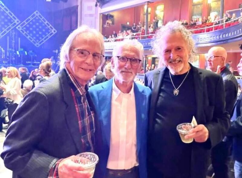 Three members of April Wine are pictured.