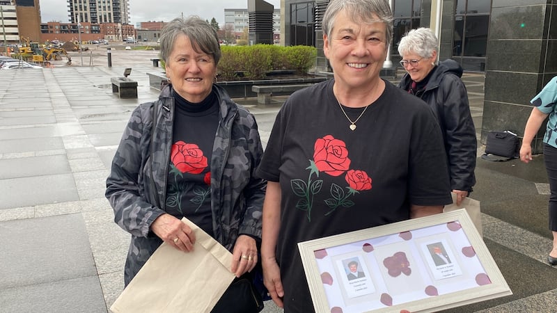 Rose-Marie Saulnier's sister Rachel Saulnier is pictured with Bernard Saulnier's niece Diane Goguen outside the courthouse in Moncton, N.B., on May 7, 2026. (Derek Haggett/CTV Atlantic)