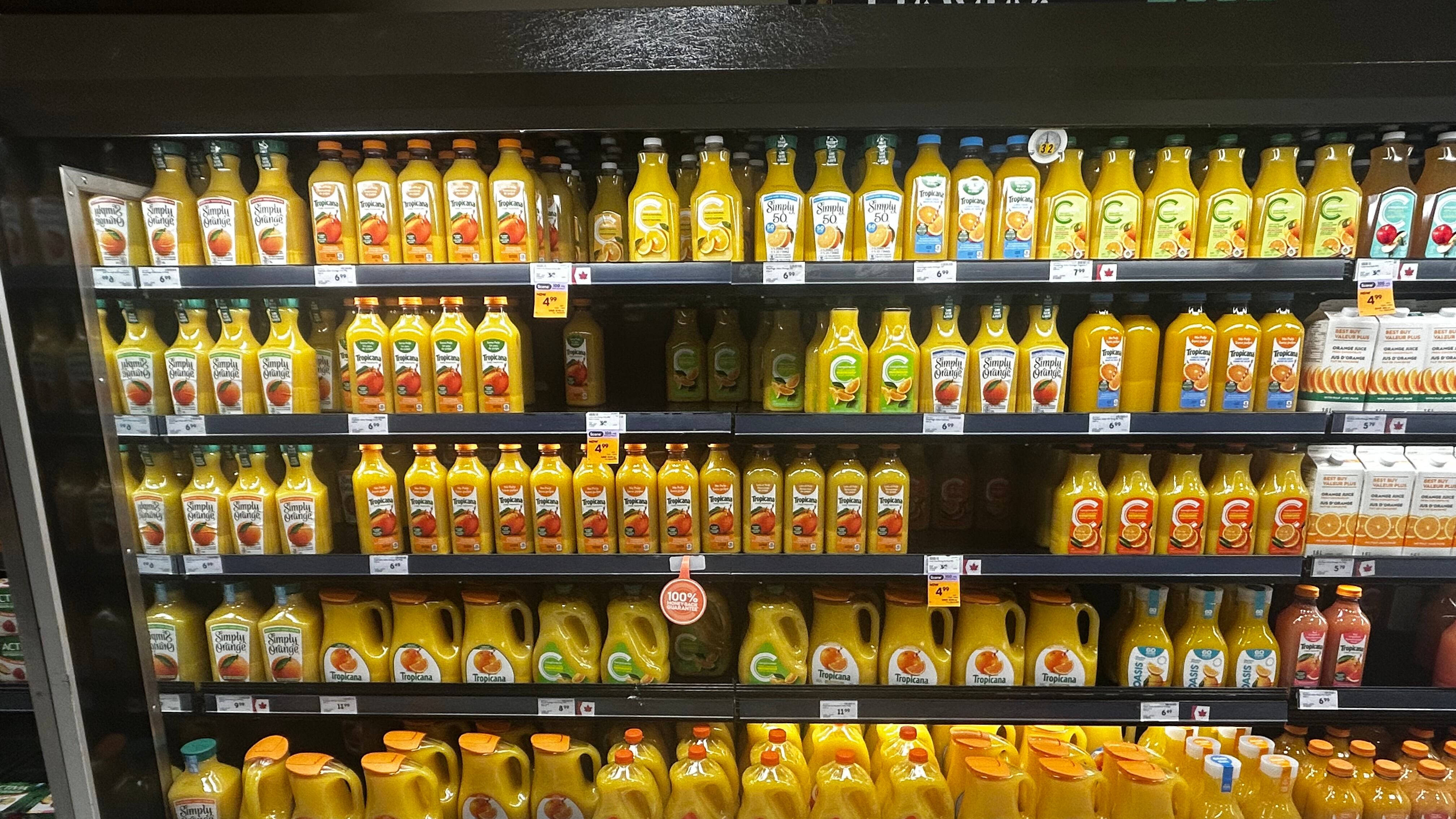 A juice cooler at a grocery store shows the orange juice almost fully-stocked. (CTV/Jonathan MacInnis)