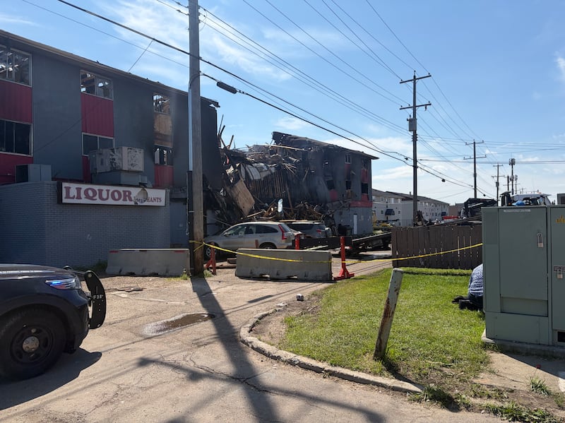 The back of a north Edmonton apartment building on July 14, 2026, the day after a fatal explosion and fire. (Evan Kenny/CTV News Edmonton)