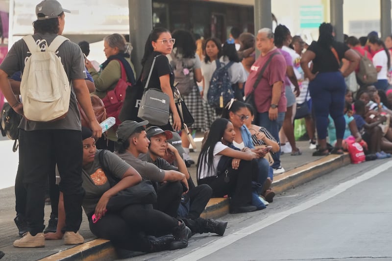 People gather outside a shopping mall after an earthquake hit Panama City on Oct. 9, 2026. (Aris Mariota / AP Photo)