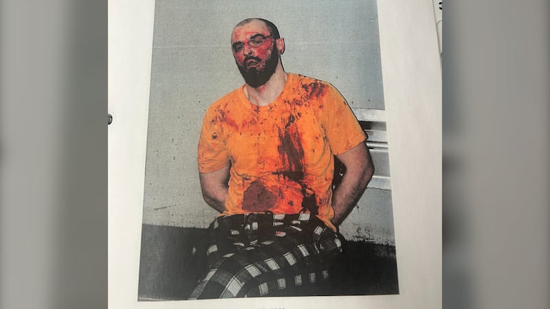 This photo of Roman Kamyshnyy, taken after he arrived at the Saint John Police Force detention centre on Jan. 29, 2025, was shown to the jury at his murder trial on June 11, 2026. (Court exhibit/New Brunswick Court of King's Bench)