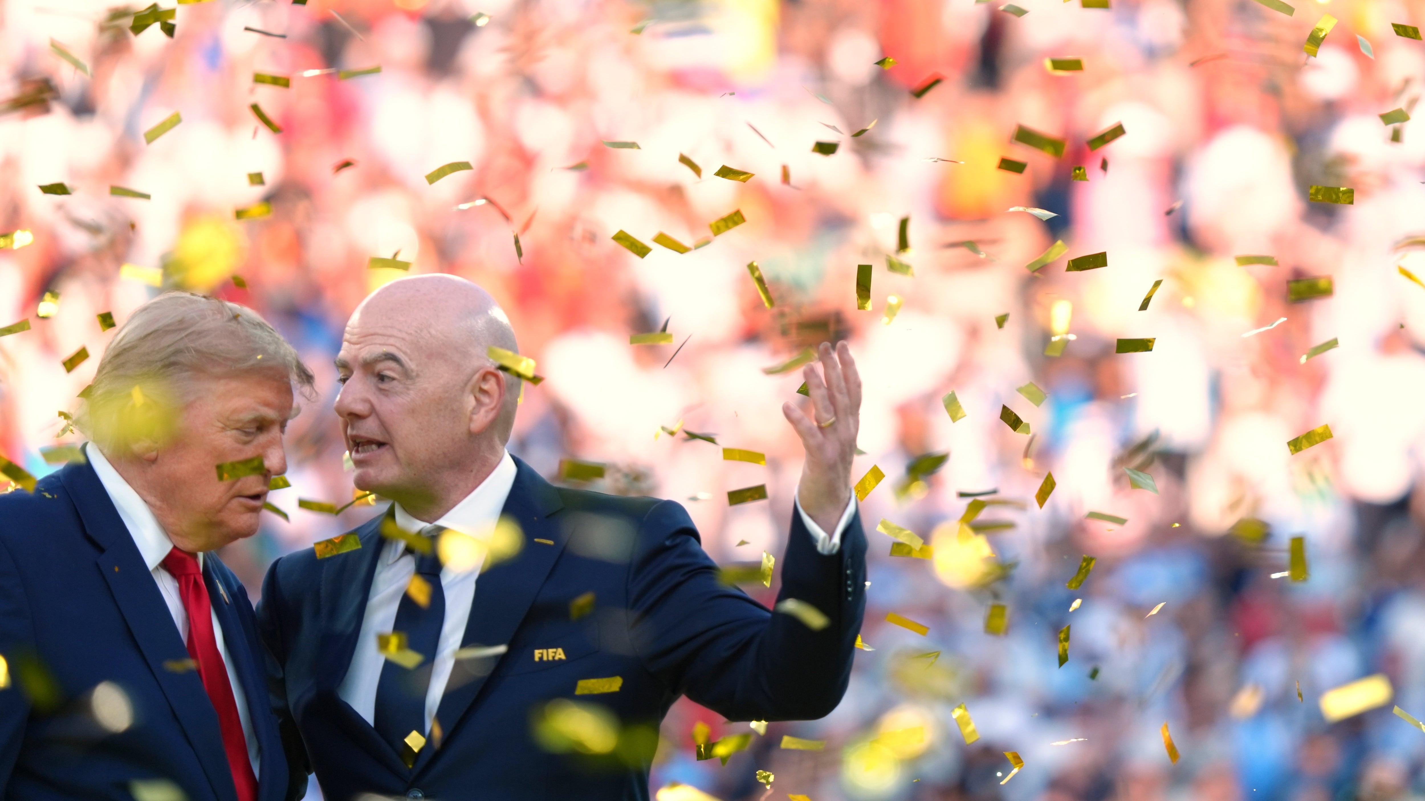 U.S. President Donald Trump, left, speaks with FIFA president Gianni Infantino as confetti falls at the conclusion of the World Cup championship final soccer match between Spain and Argentina in East Rutherford, N.J., on July 19, 2026. (Jacquelyn Martin / AP Photo)