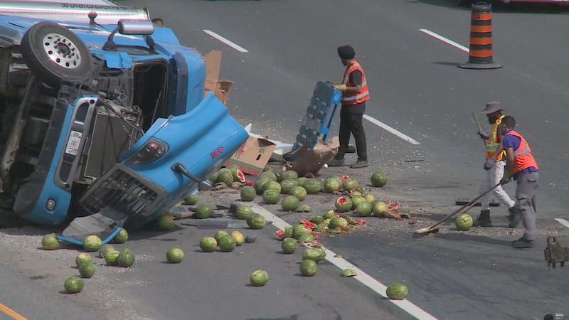 Watermelons scattered on roadway following tractor trailer crash on Hwy. 401 in Halton Hills