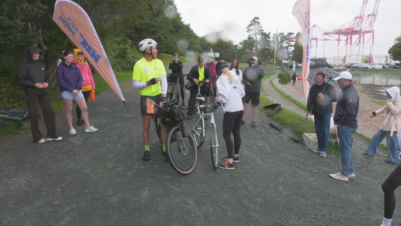 Rich and Pam Eyram celebrate with loved ones in Halifax after completing their coast-to-coast trip. (CTV/Jesse Thomas)