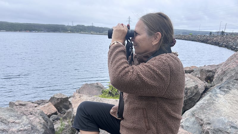 Raylene McDougall with binoculars